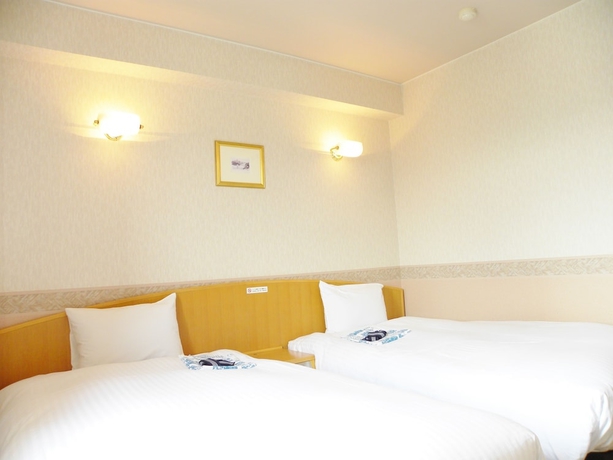 Imagen de la habitación del Hotel Benex Yonezawa. Foto 9