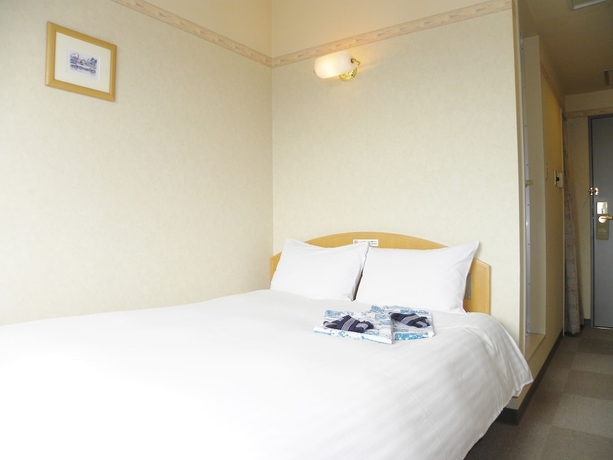 Imagen de la habitación del Hotel Benex Yonezawa. Foto 10