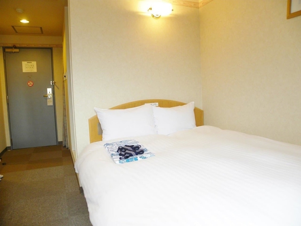 Imagen de la habitación del Hotel Benex Yonezawa. Foto 12