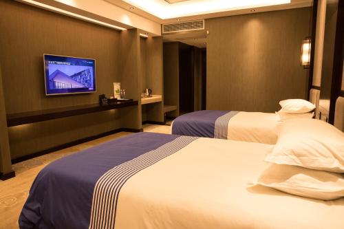 Imagen de la habitación del Hotel Bengbu Langsheng Xingmai. Foto 8