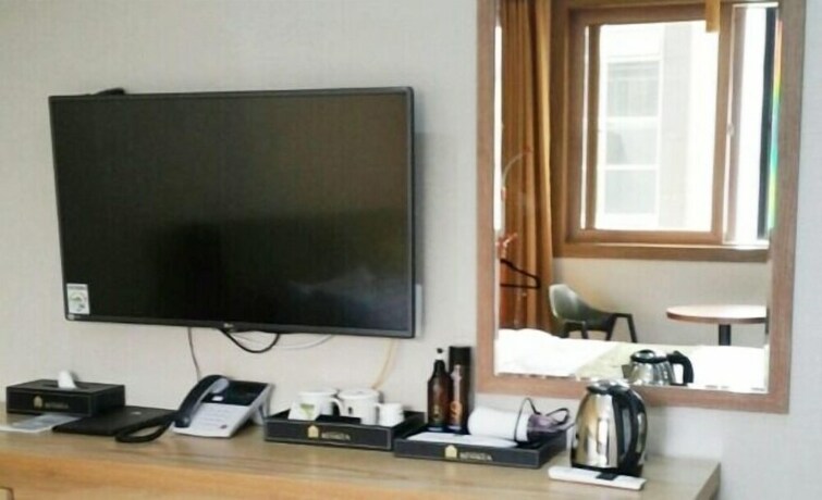 Imagen de la habitación del Hotel Benikea Central. Foto 14