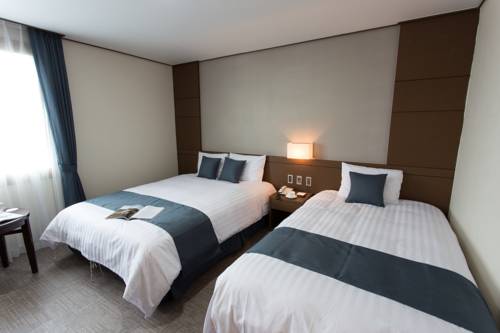 Imagen de la habitación del Hotel Benikea Jeju. Foto 1