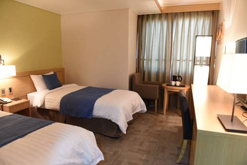 Imagen de la habitación del Hotel Benikea Jeju. Foto 6