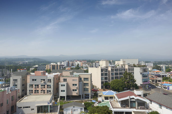 Imagen del bar/restaurante del Hotel Benikea Jungmun. Foto 9