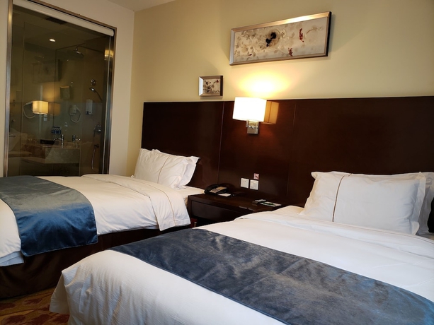Imagen de la habitación del Hotel Benjoy - Jinqiao Branch. Foto 11