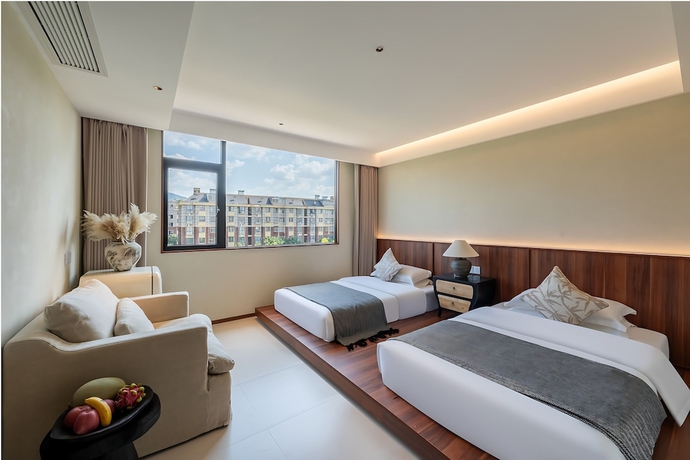 Imagen de la habitación del Hotel Benjue Rushi Guesthouse Taoxichuan. Foto 2