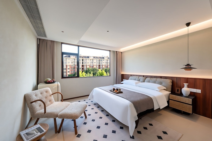 Imagen de la habitación del Hotel Benjue Rushi Guesthouse Taoxichuan. Foto 8