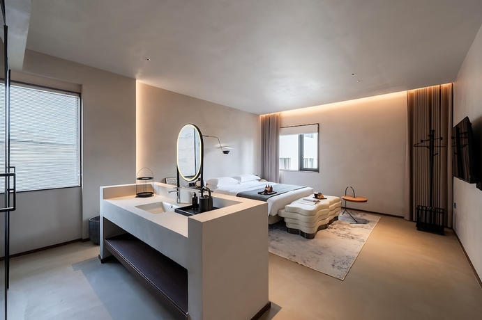 Imagen de la habitación del Hotel Benjue Rushi Guesthouse Taoxichuan. Foto 9