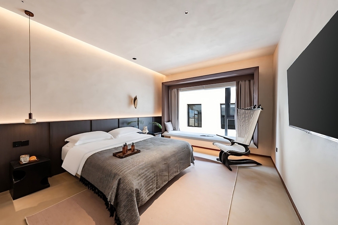 Imagen de la habitación del Hotel Benjue Rushi Guesthouse Taoxichuan. Foto 10