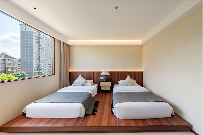 Imagen de la habitación del Hotel Benjue Rushi Guesthouse Taoxichuan. Foto 15