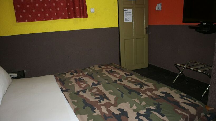 Imagen de la habitación del Hotel Benjy\'s Lodge. Foto 13