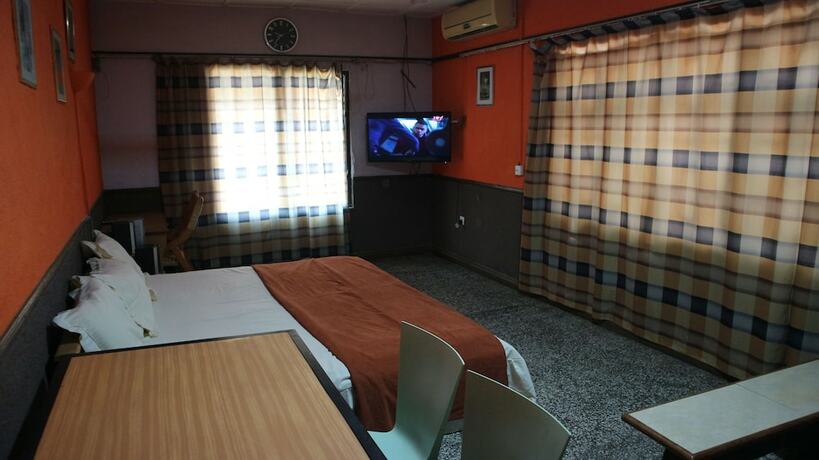 Imagen de la habitación del Hotel Benjy\'s Lodge. Foto 14