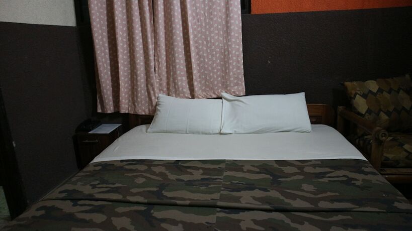 Imagen de la habitación del Hotel Benjy\'s Lodge. Foto 16
