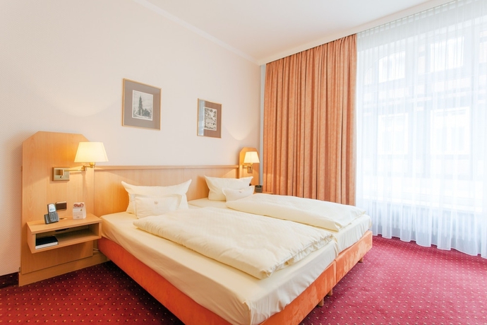 Imagen de la habitación del Hotel Benn. Foto 12