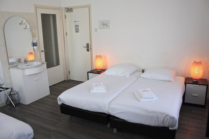 Imagen de la habitación del Hotel Benno. Foto 13