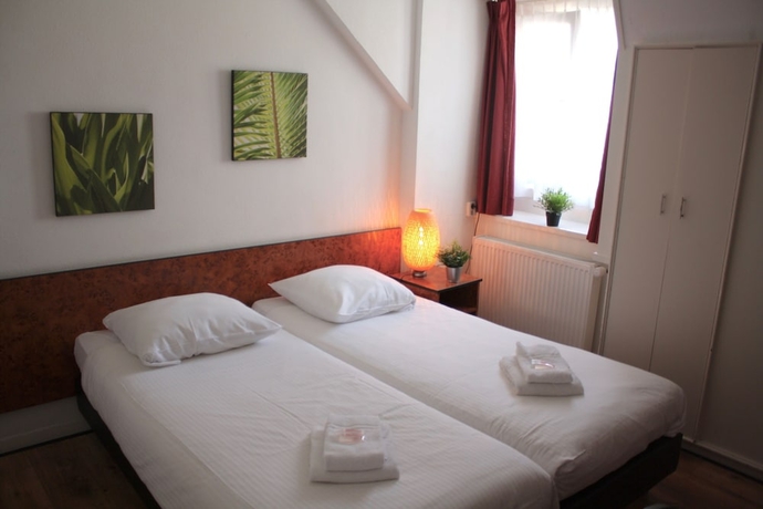 Imagen de la habitación del Hotel Benno. Foto 14
