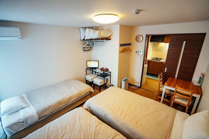 Imagen de la habitación del Hotel Ben's Guesthouse Kyoto. Foto 21