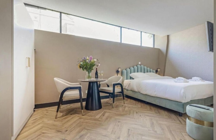 Imagen de la habitación del Hotel Bens The Walton. Foto 1
