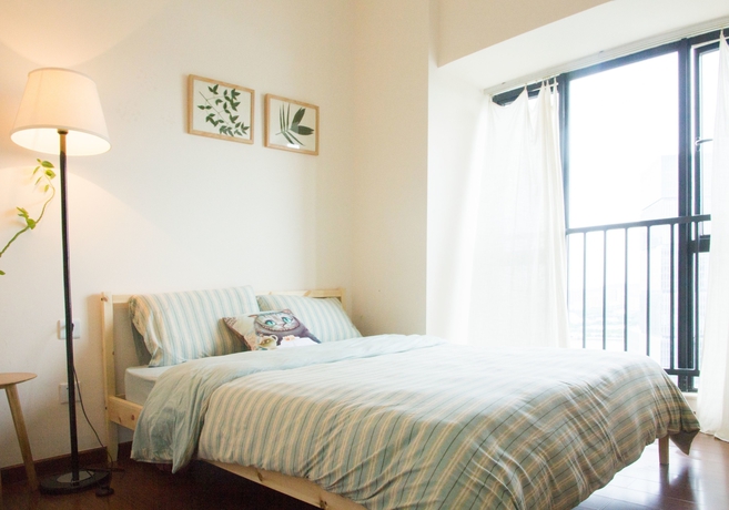 Imagen de la habitación del Hotel Benshujia Apartment Pazhou Complex. Foto 4