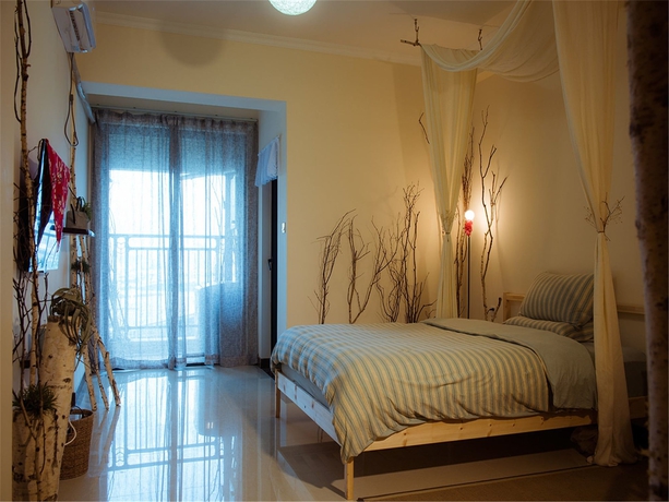 Imagen de la habitación del Hotel Benshujia Apartment Pazhou Complex. Foto 12
