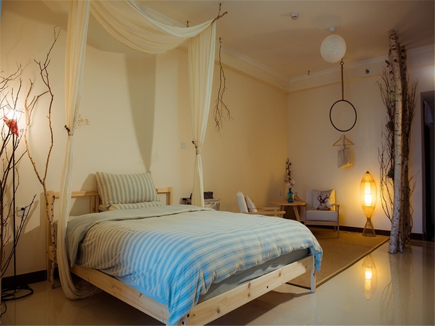 Imagen de la habitación del Hotel Benshujia Apartment Pazhou Complex. Foto 14