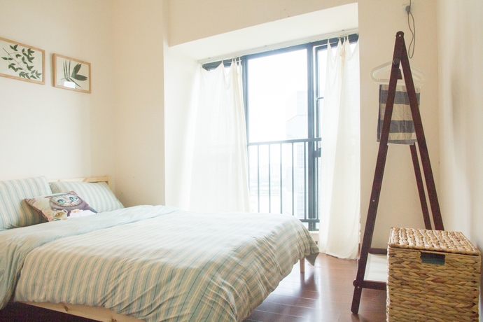 Imagen de la habitación del Hotel Benshujia Apartment Pazhou Complex. Foto 15