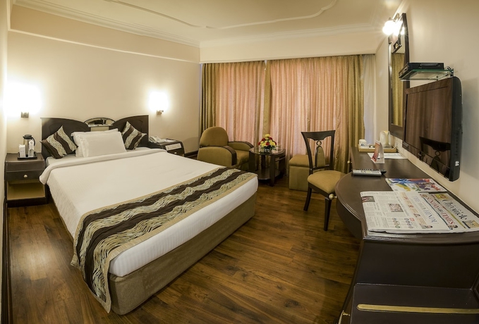 Imagen de la habitación del Hotel Benzz Park. Foto 15