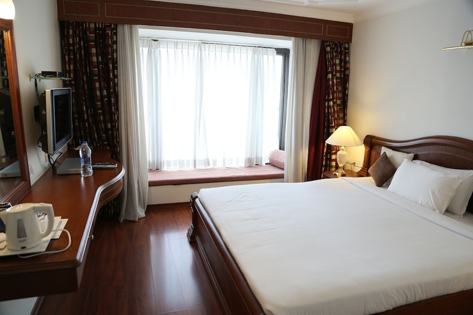 Imagen de la habitación del Hotel Benzz Park. Foto 16