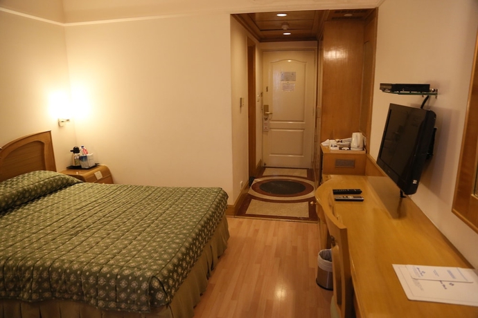 Imagen de la habitación del Hotel Benzz Park. Foto 18