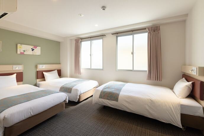 Imagen de la habitación del Hotel Beppu Daiiti. Foto 31