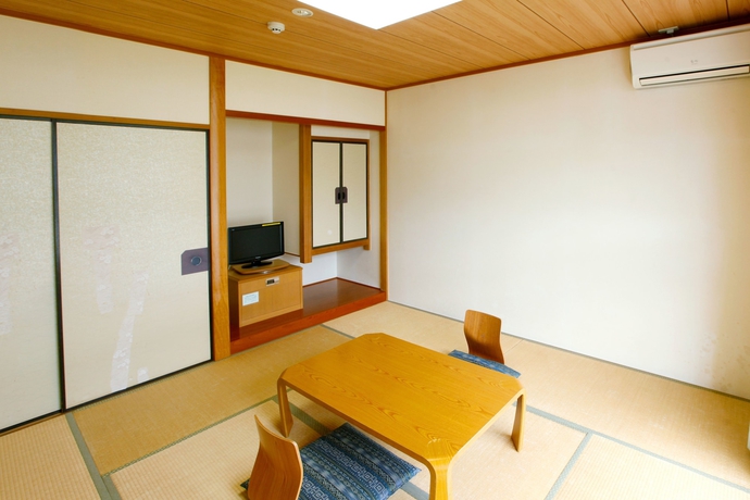 Imagen de la habitación del Hotel Beppu Housensou. Foto 13