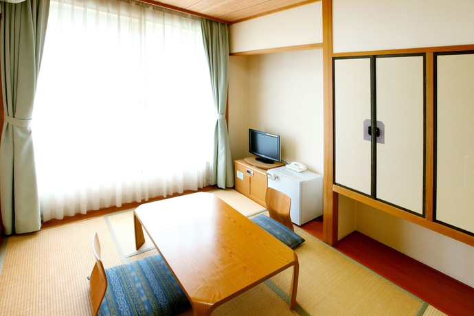 Imagen de la habitación del Hotel Beppu Housensou. Foto 15