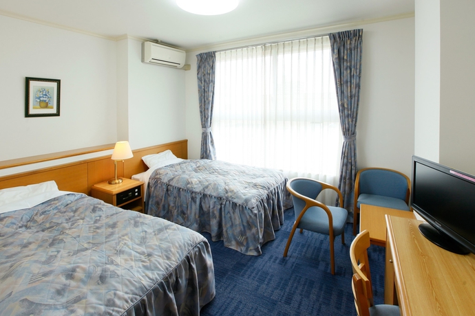 Imagen de la habitación del Hotel Beppu Housensou. Foto 16