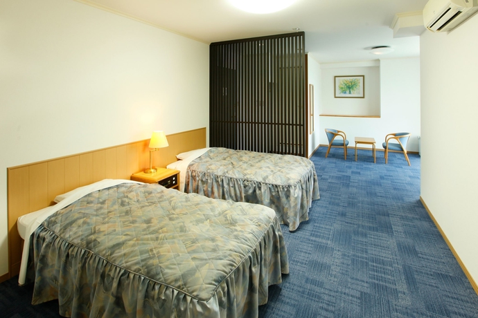 Imagen de la habitación del Hotel Beppu Housensou. Foto 17