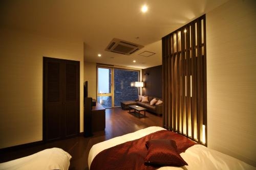 Imagen de la habitación del Hotel Beppu Kankaiji Onsen Ryotei Matsubaya. Foto 9