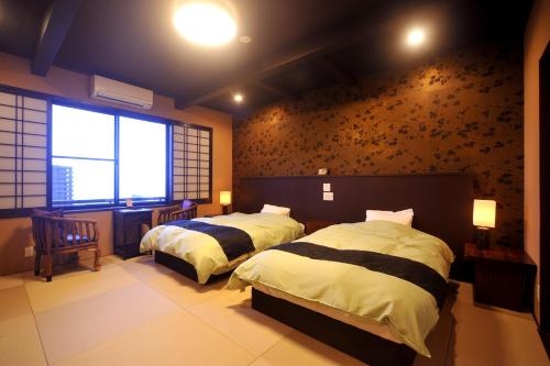 Imagen de la habitación del Hotel Beppu Kankaiji Onsen Ryotei Matsubaya. Foto 10