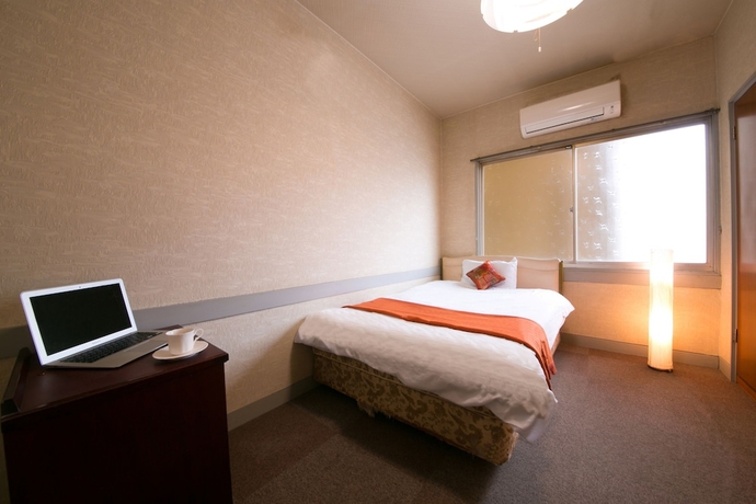 Imagen de la habitación del Hotel Beppu Koraku. Foto 13