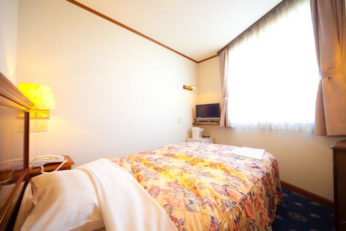 Imagen de la habitación del Hotel Beppu Station. Foto 4