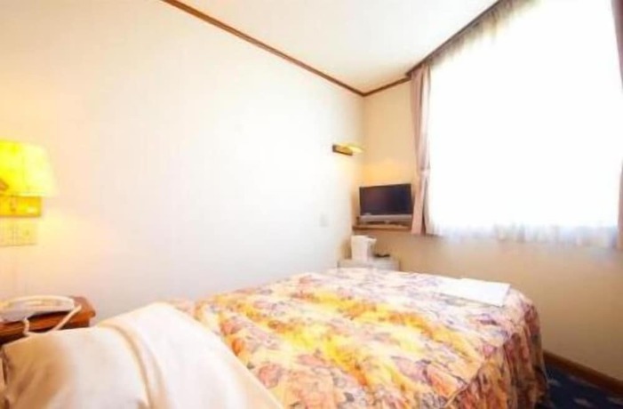 Imagen de la habitación del Hotel Beppu Station. Foto 5