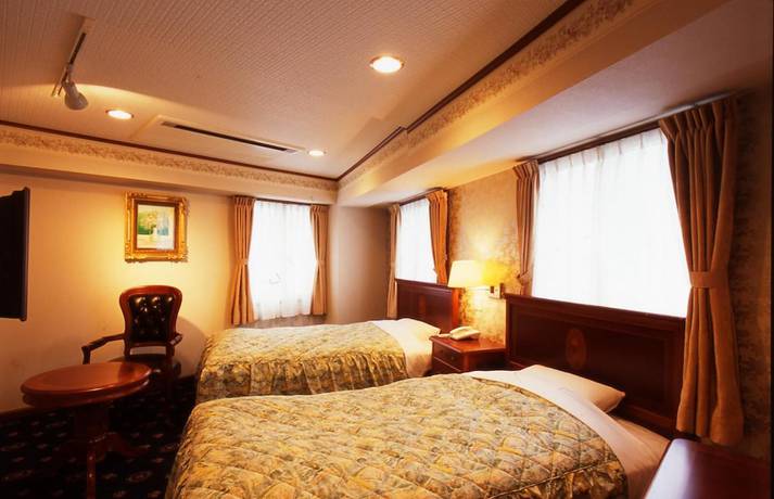 Imagen de la habitación del Hotel Beppu Station. Foto 11
