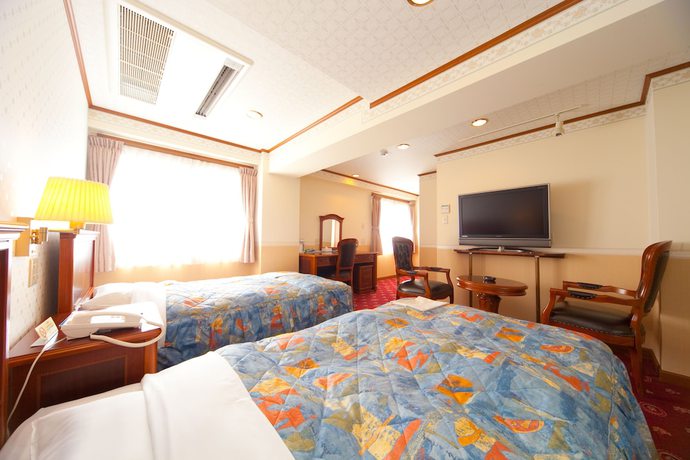 Imagen de la habitación del Hotel Beppu Station. Foto 12