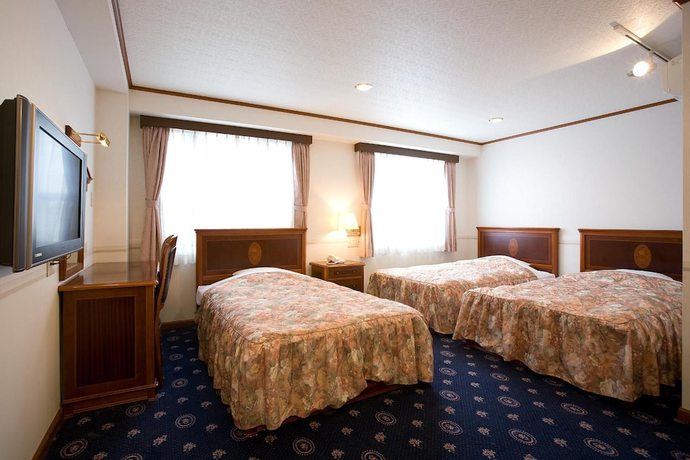 Imagen de la habitación del Hotel Beppu Station. Foto 13