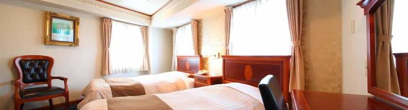 Imagen de la habitación del Hotel Beppu Station. Foto 17