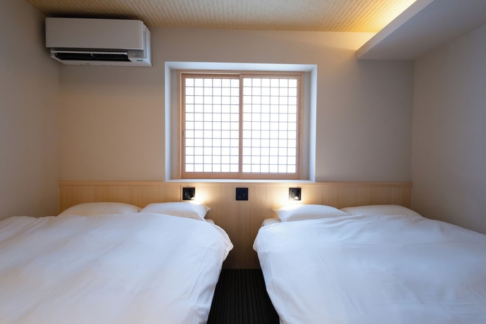 Imagen de la habitación del Hotel Beppu Yunagi. Foto 8