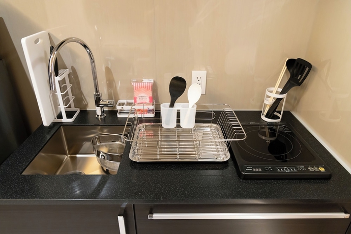 Imagen de la habitación del Hotel Beppu Yunagi. Foto 11