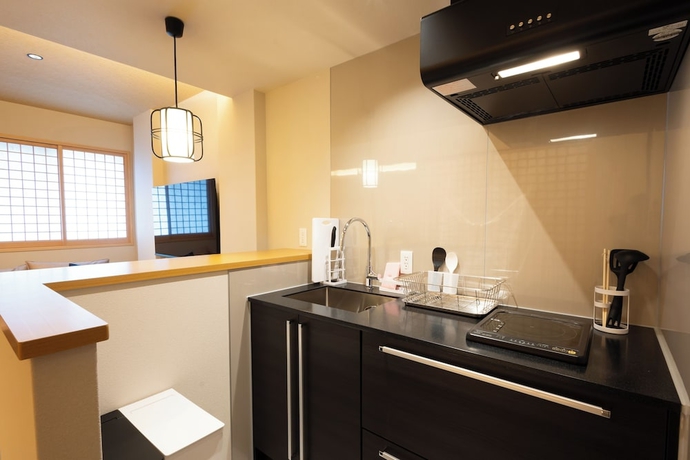 Imagen de la habitación del Hotel Beppu Yunagi. Foto 12
