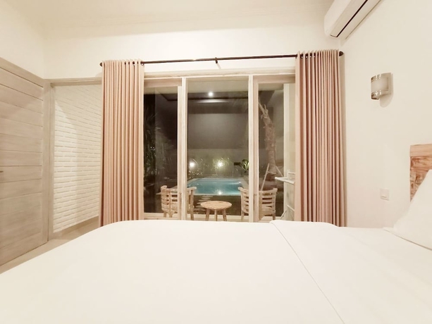 Imagen de la habitación del Hotel Berawa Dini Guesthouse. Foto 6