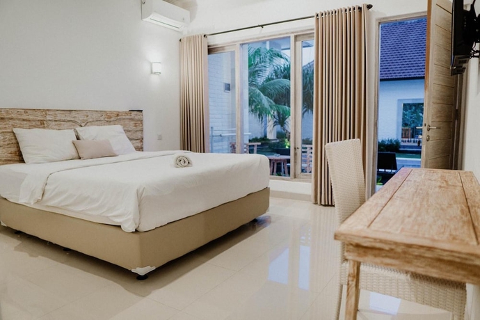 Imagen de la habitación del Hotel Berawa Dini Guesthouse. Foto 8
