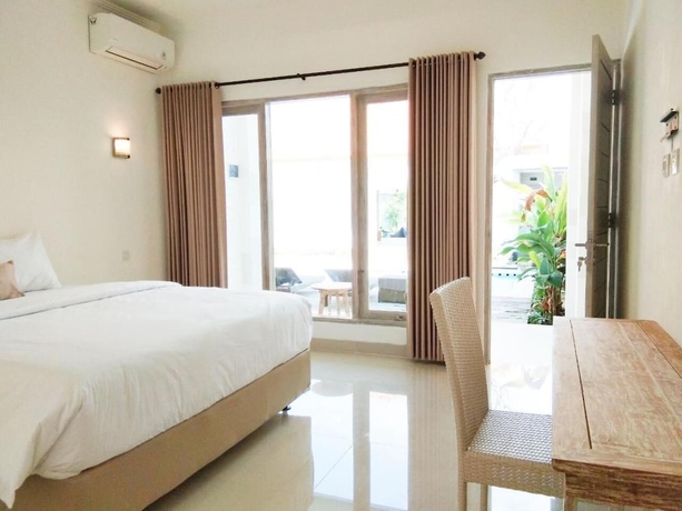 Imagen de la habitación del Hotel Berawa Dini Guesthouse. Foto 11
