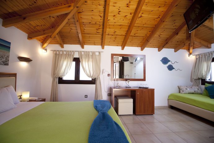 Imagen de la habitación del Hotel Berdoussis. Foto 19